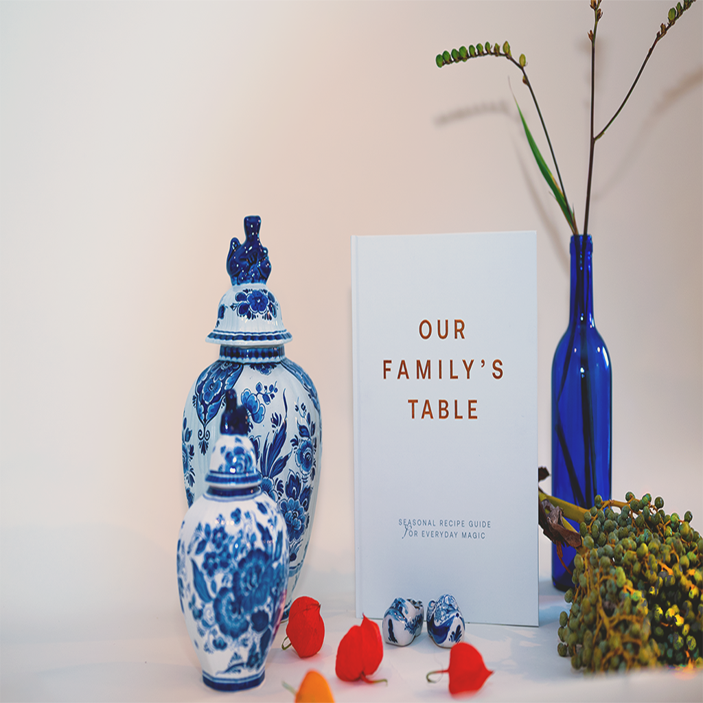 Lifestyle portrait with Our Family’s Table cookbook – Glimmery Moments seasonal heritage project